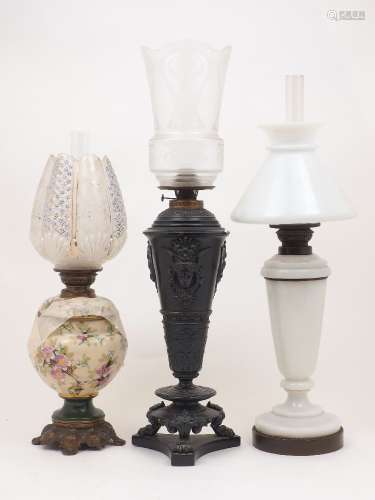 A group of three oil lamps, early 20th century, comprising: ...