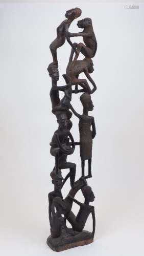 An African carved hardwood 'Tree of Life' sculpture, featuri...