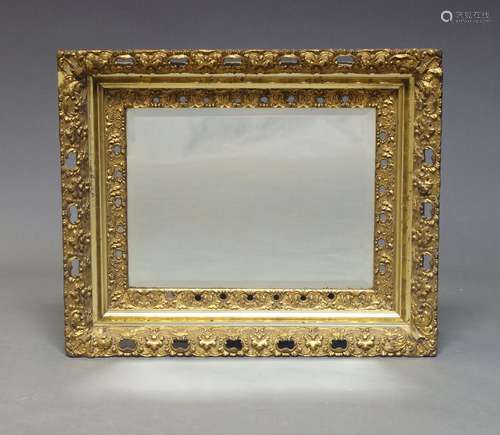 A gilt wood wall mirror, late 20th Century, of rectangular f...