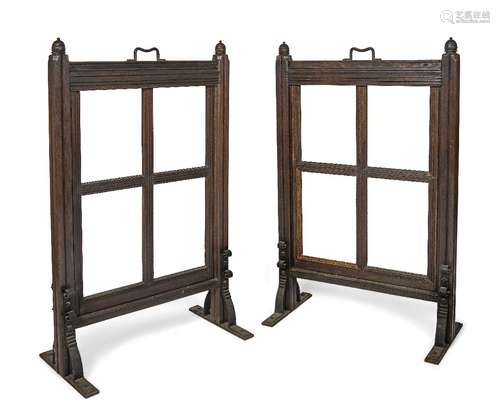 A pair of late Victorian oak screens, c.1890, with turned be...