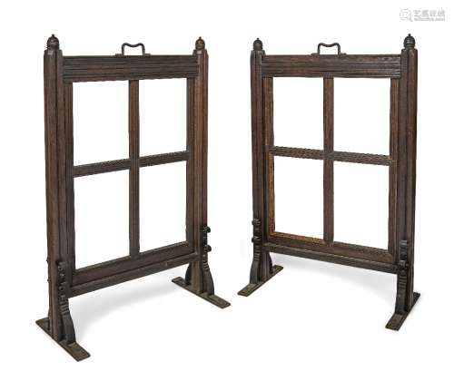 A pair of late Victorian oak screens, c.1890, with turned be...