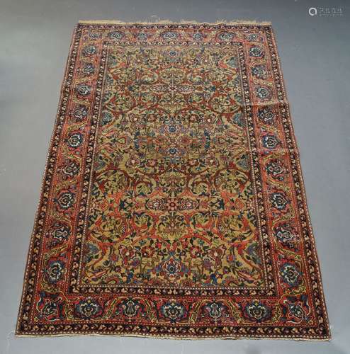 A Heriz rug, mid 20th Century, with overall floral design in...