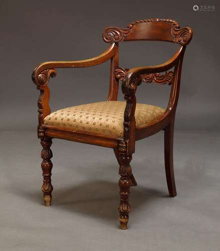 A William IV mahogany armchair, the shaped bar back with car...