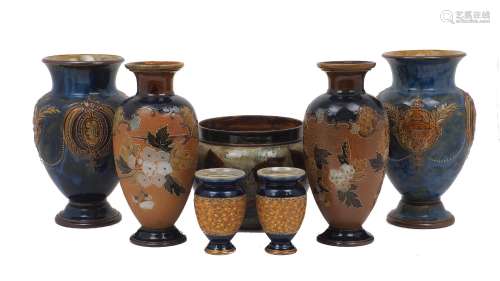 Three pairs of Royal Doulton vases, 20th century, comprising...