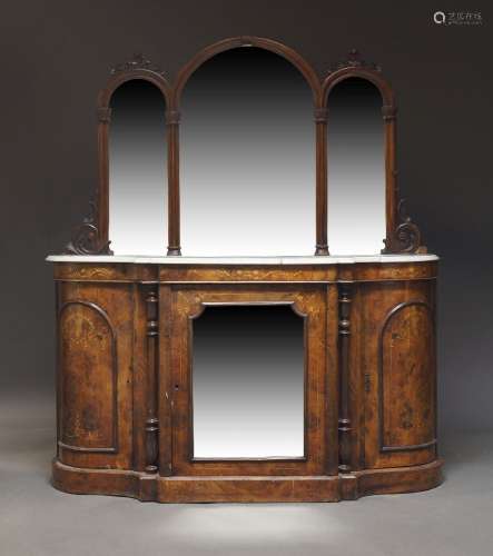 A Victorian walnut, inlaid and mirrored credenza, the shaped...