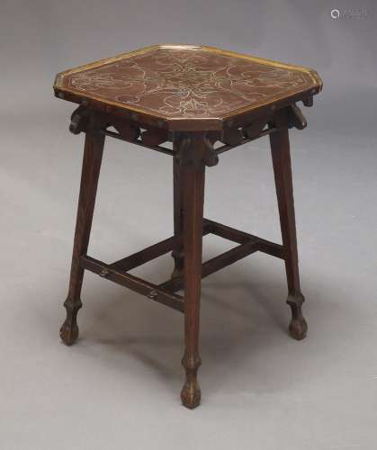 An Arts and Crafts copper and oak occasional table, the copp...