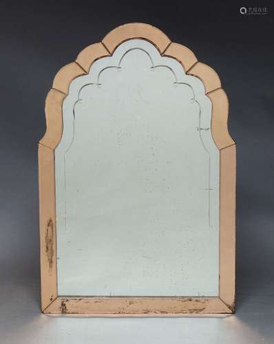 An Art Deco wall mirror, of arched form with engraved plate ...