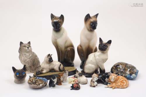 A group of Beswick ceramic cats, 20th Century, including a s...