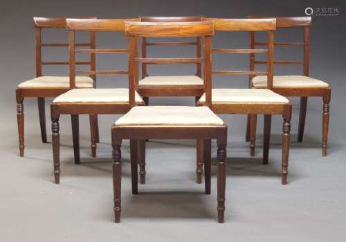 A set of six Victorian mahogany and brass inlaid dining chai...