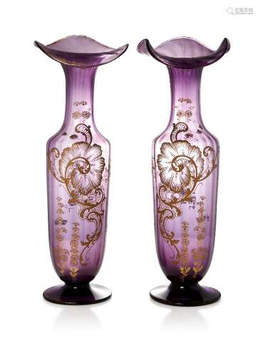 A pair of gilt-heightened purple glass vases, late 19th cent...