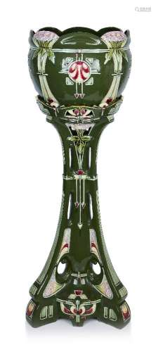 A continental Art Nouveau green glazed ceramic jardinière an...