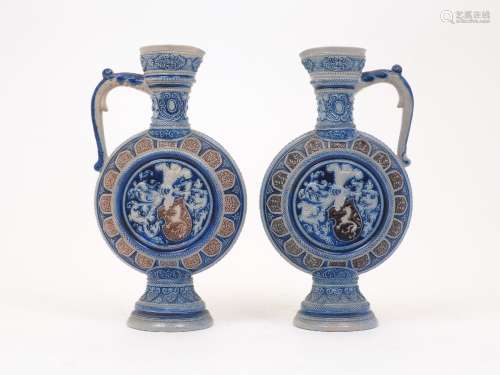 A pair of German cobalt blue and grey salt glazed stoneware ...