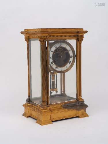 A gilt metal and glass sided mantle clock, 20th Century, in ...