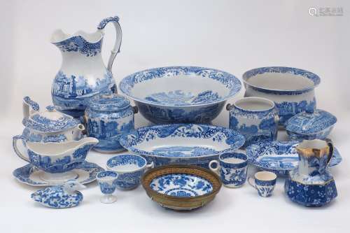 A large quantity of transfer printed blue and white ceramic ...
