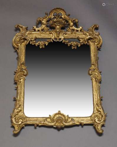 A Louis XV style gilt gesso wall mirror, early 20th Century,...
