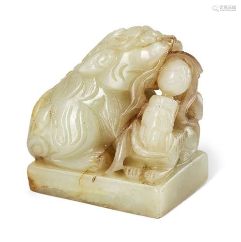 A Chinese green jade 'lion' seal, 20th century, carved as a ...