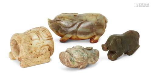 Four Chinese archaistic jade carvings, 19th century, compris...