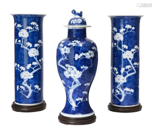 A pair of Chinese porcelain large sleeve vases and a baluste...