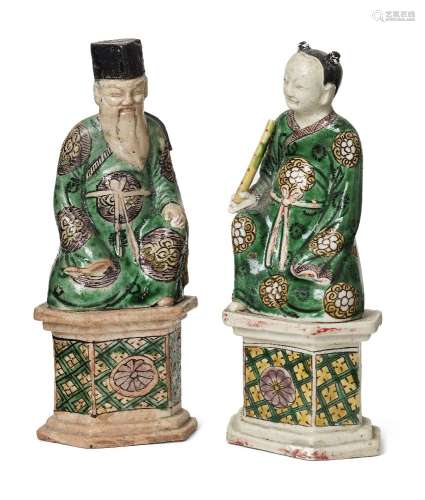 A pair of Chinese biscuit porcelain 'Immortals' figures, Kan...