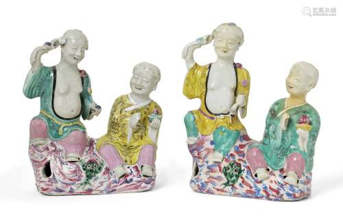 A pair of Chinese export porcelain figure groups of Hehe Erx...