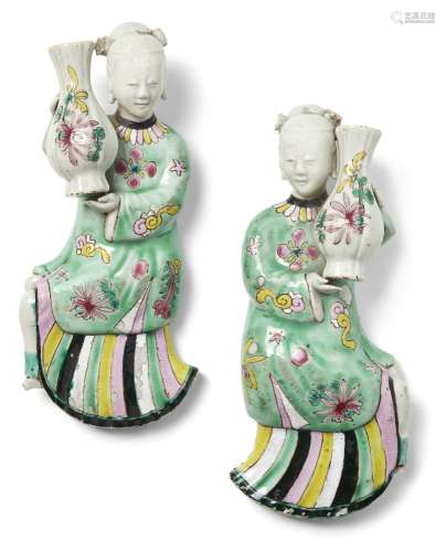 A pair of Chinese porcelain flat back figural wall pockets, ...