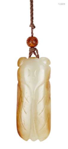 A Chinese green jade 'cicada' pendant, 18th century, carved ...