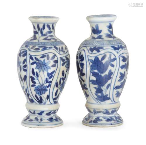 A pair of Chinese porcelain miniature moulded baluster vases...