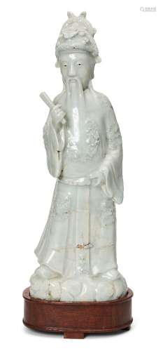 A Chinese qingbai stoneware figure, Qing dynasty, moulded as...