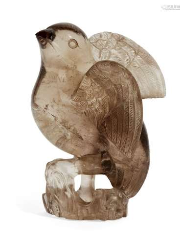 A Chinese rock crystal bird, 19th century, carved with wings...