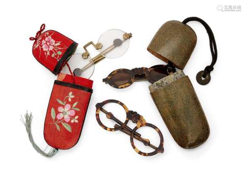 Two Chinese spectacles cases, late Qing dynasty, one silk em...