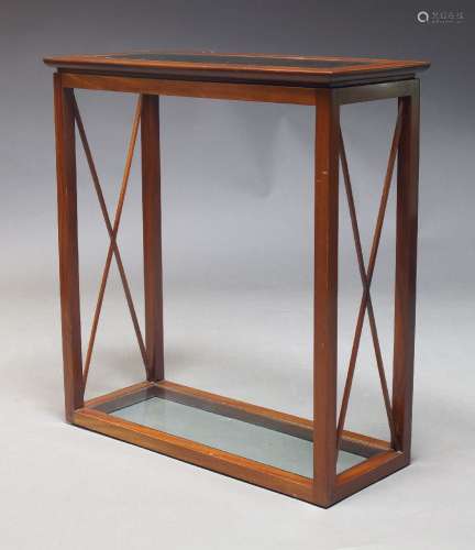 A modern mahogany and glazed console table, late 20th Centur...