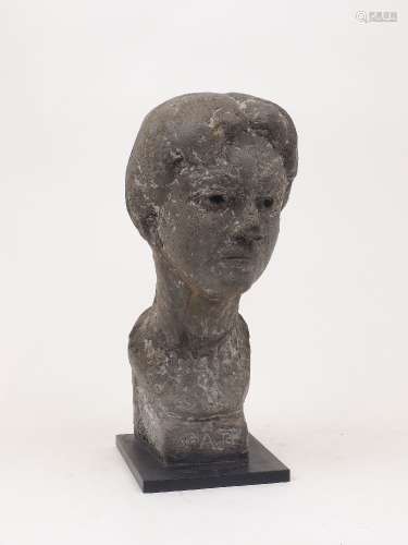 A carved grey stone bust of a lady, titled 'PAT' to the fron...