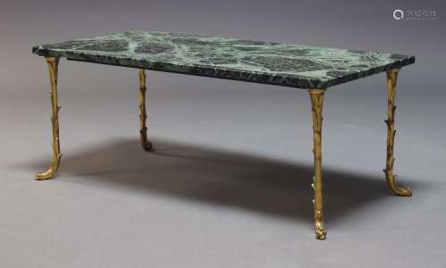 Attributed to Maison Bagués, a marble top and brass coffee t...