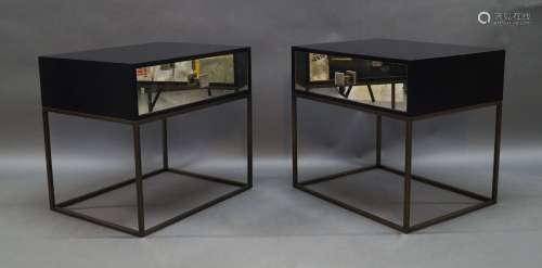 A pair of contemporary ebonised and mirrored side tables, of...