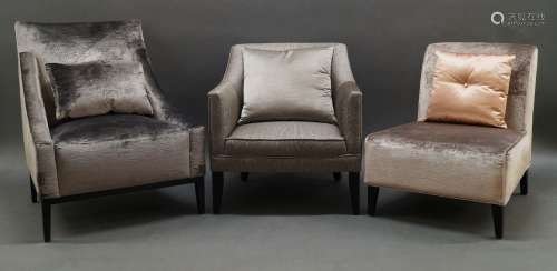 A contemporary armchair, of recent manufacture with grey vel...