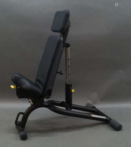 A Technogym adjustable workout bench, of recent manufacture,...