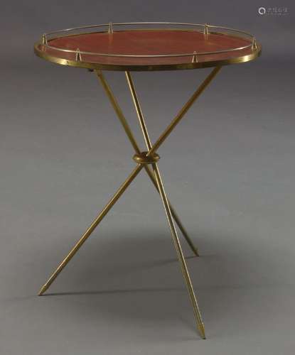 An Italian gilt metal side table, c.1950, with circular wood...
