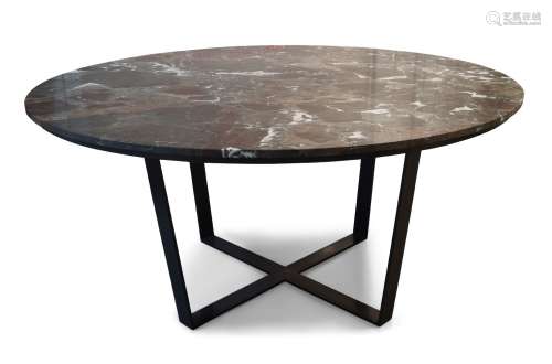 A large contemporary circular marble dining table, the grey ...