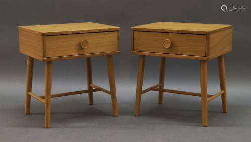 A pair of contemporary oak bedside tables, of recent manufac...