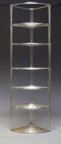A set of chromed metal free standing corner shelves, c.1940,...
