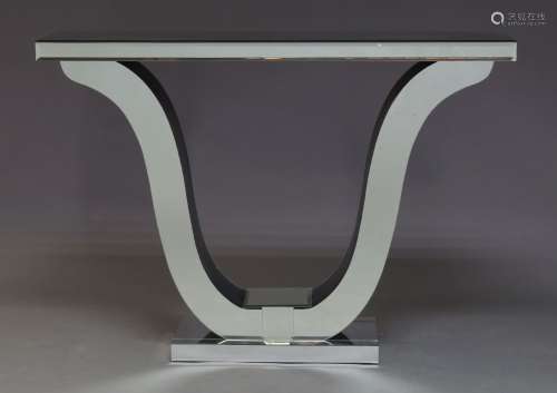 A mirrored console table, of recent manufacture, with rectan...