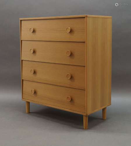 A contemporary chest of drawers, of recent manufacture with ...