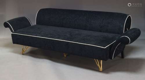 A modern black three seater sofa, late 20th Century, upholst...