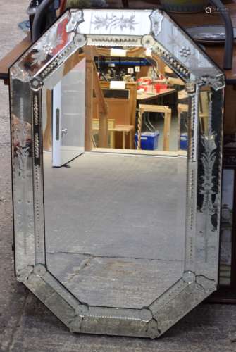 A VINTAGE VENETIAN ETCHED GLASS MIRROR of octagonal form. 10...
