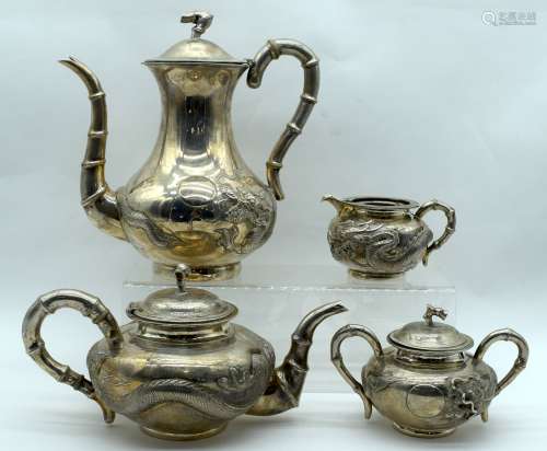 A LATE 19TH CENTURY CHINESE SHANGHAI EXPORT FOUR PIECE SILVE...
