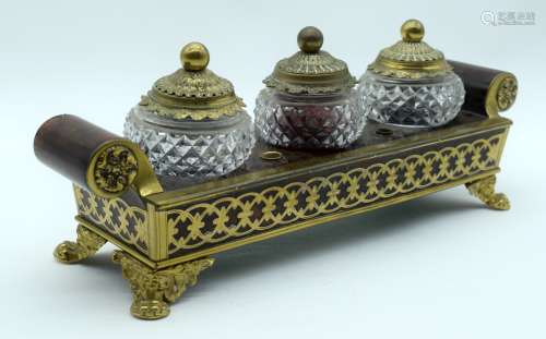 AN ENGLISH REGENCY BOULLE AND GILT METAL INKWELL decorated w...