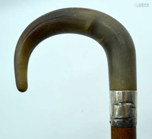 A 19TH CENTURY MIDDLE EASTERN CARVED RHINOCEROS HORN HANDLED...
