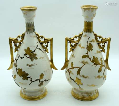 A PAIR OF 19TH CENTURY AESTHETIC MOVEMENT TWIN HANDLED PORCE...
