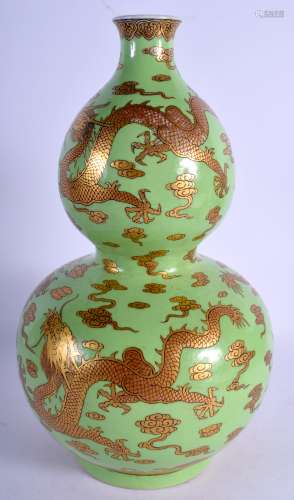 A VERY RARE CHINESE DOUBLE GOURD DRAGON VASE with golden clo...