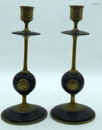 A PAIR OF 19TH CENTURY FRENCH BRASS CANDLESTICKS decorated w...